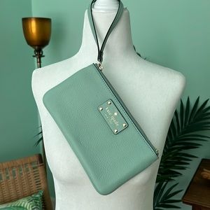 Bright and fun greenish blue Kate Spade wristlet